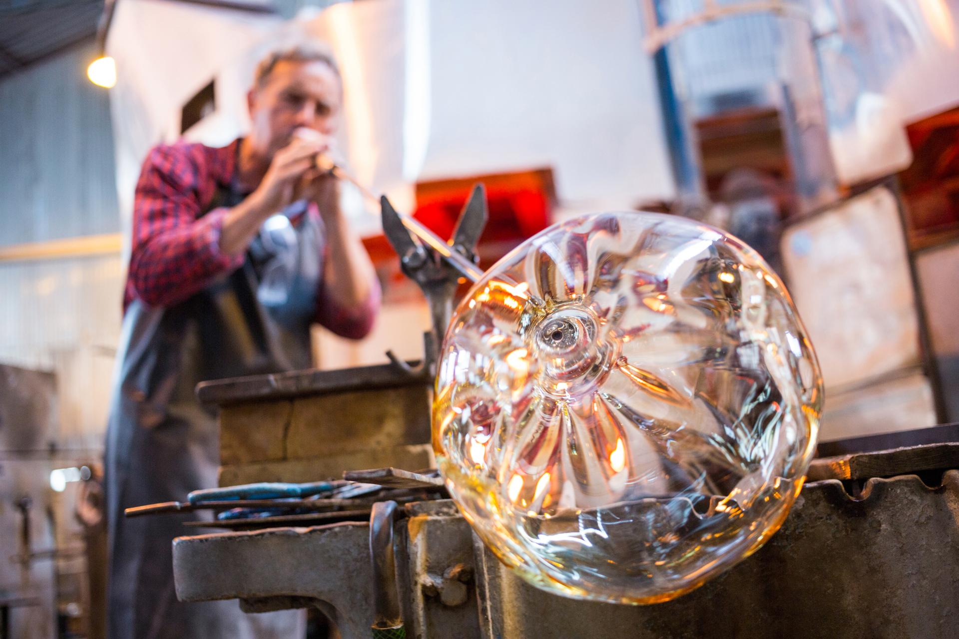 Molten glass glowing red at a Murano furnace